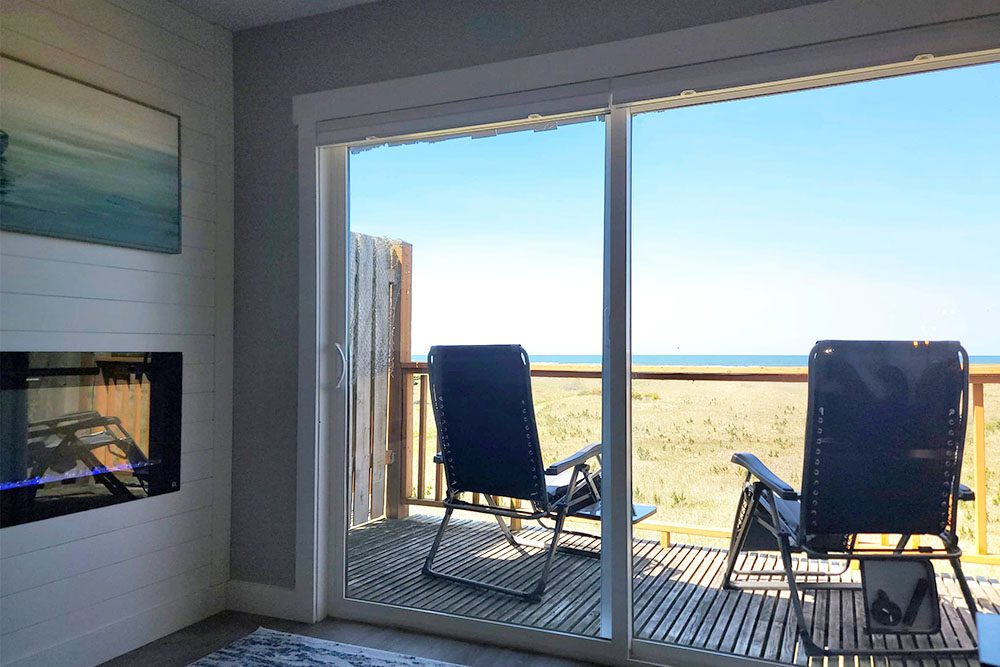 Oceanfront condo living room at Chautauqua Resort